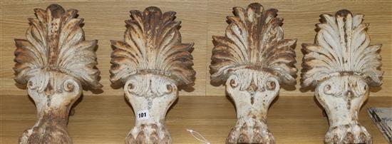 A set of four cast iron lion paw bath feet 30cm high